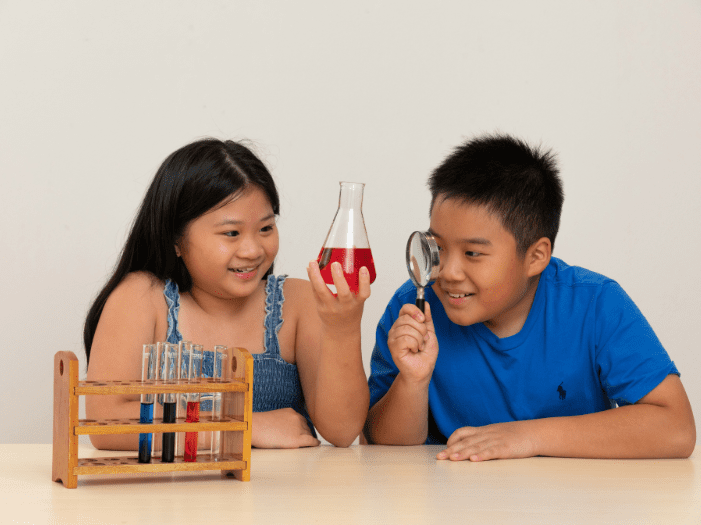 Two children exploring Science experiments